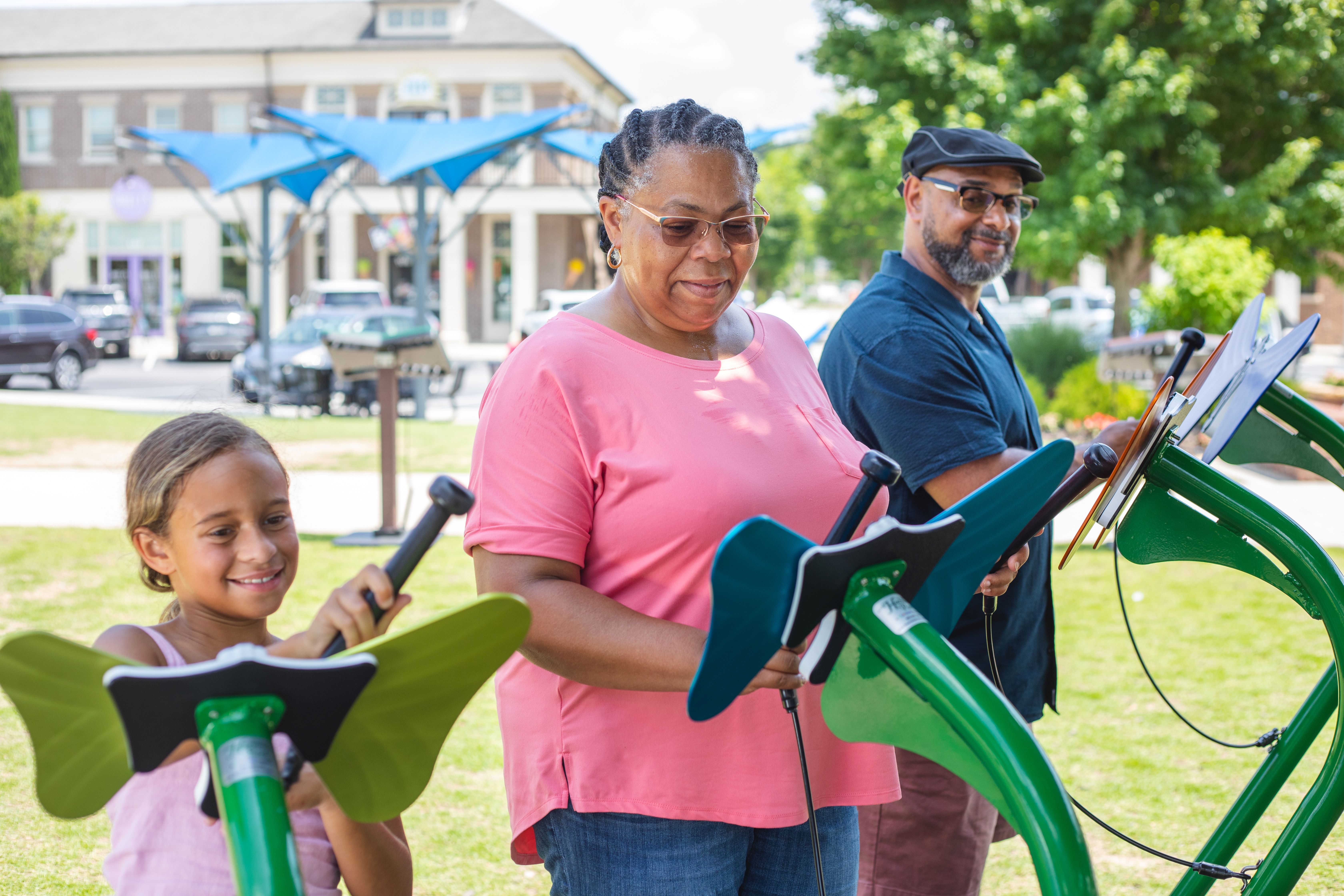 Family spending time together at IMPACT Parks playground