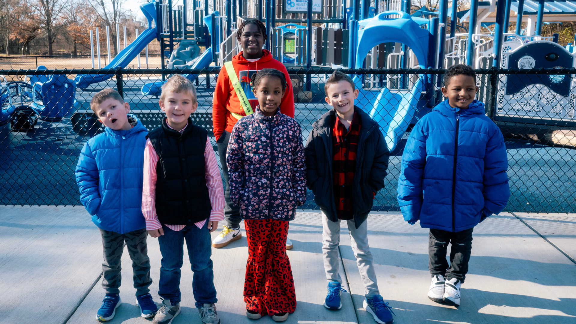 Kids in community smiling at BCBS Healthy Place Grand Opening