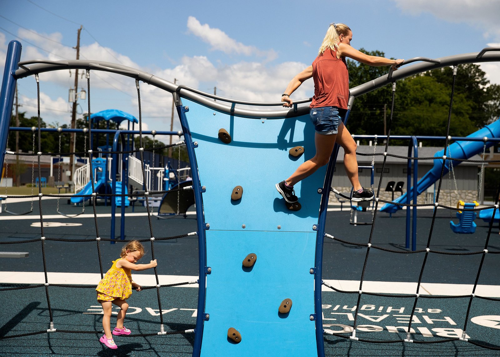 Mother and daughter climbing on IMPACT Parks BCBS playground