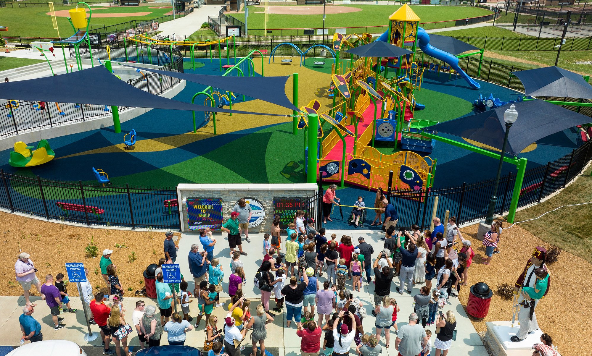 Playcore Park grand opening ribbon cutting in community