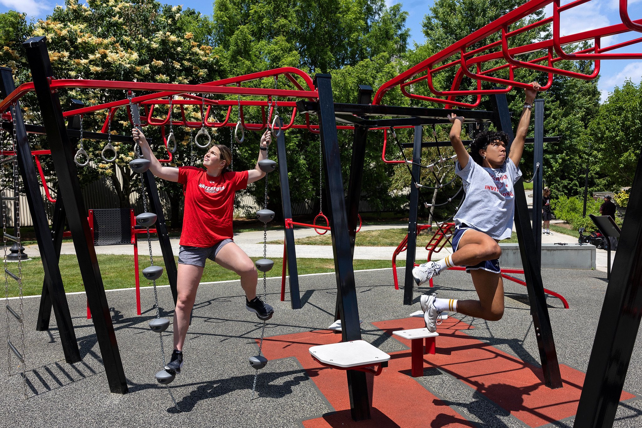 Students working out at Outdoor Fitness park on campus