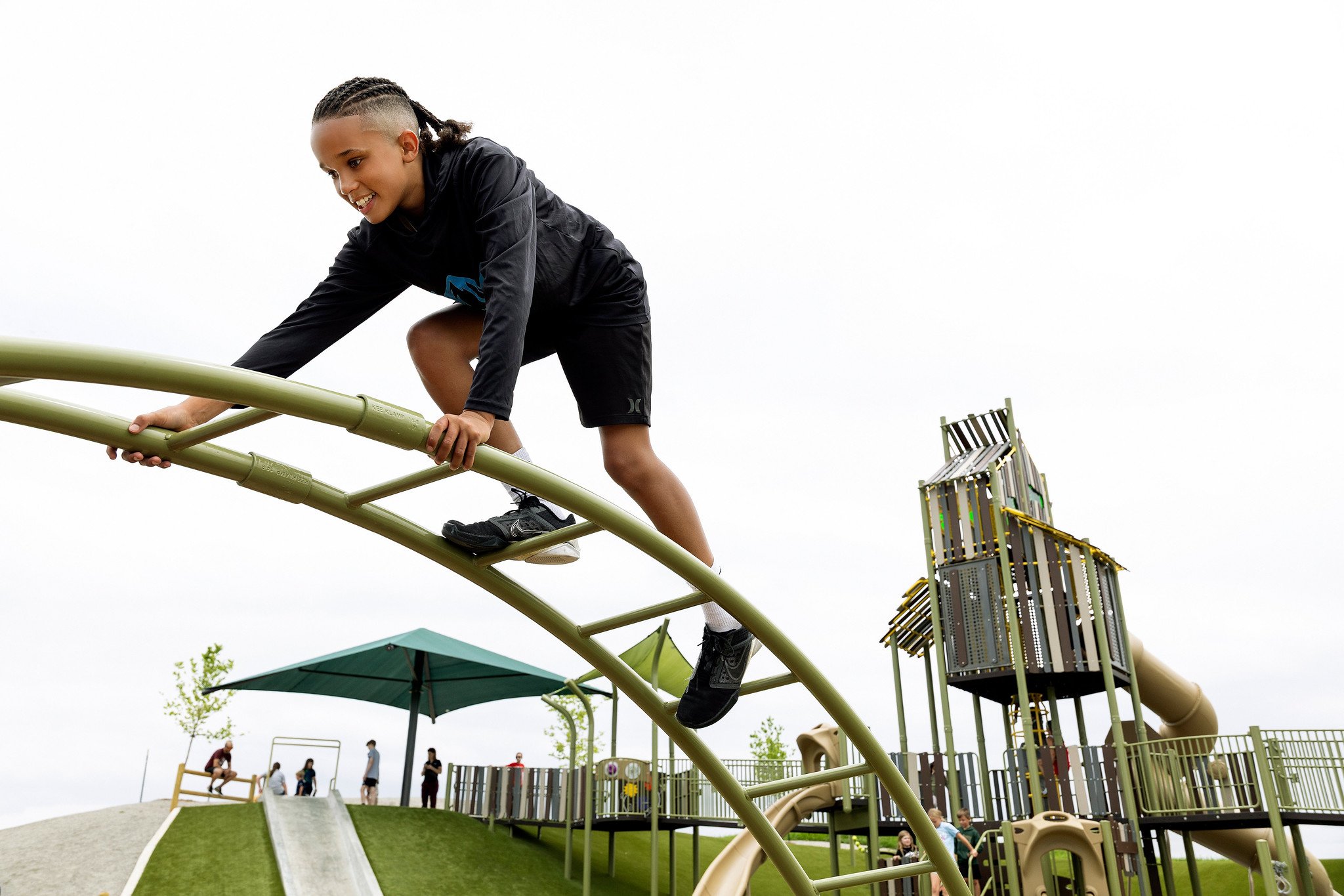 Boy climbing on playground