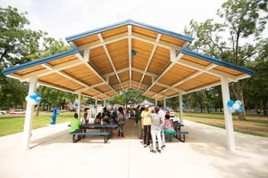 Community gathering in BCBS and IMPACT Parks pavilion
