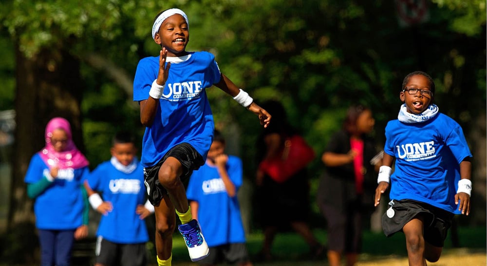 Children running at the play 60 park