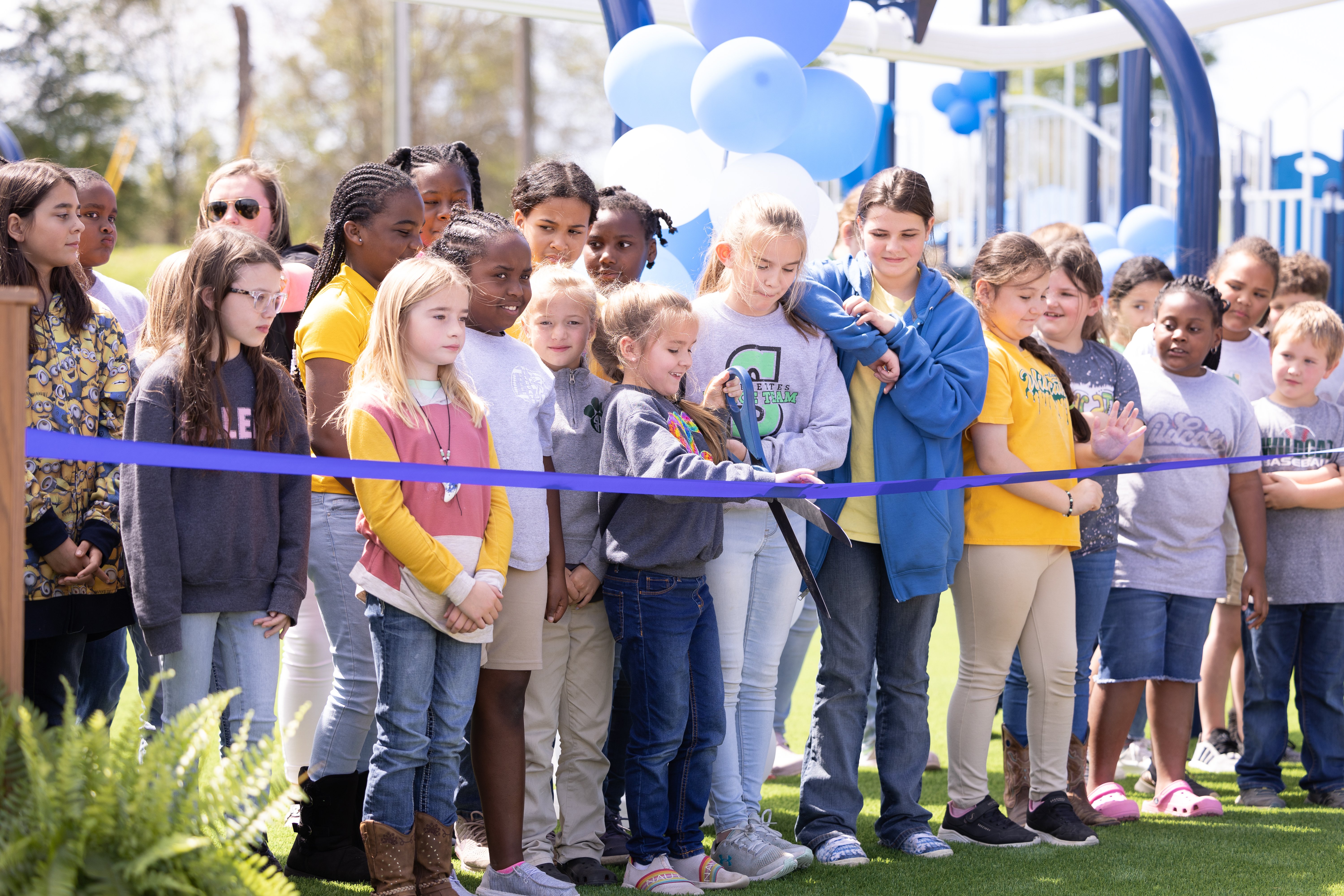 Community ribbon cutting at BCBS and IMPACT parks playground