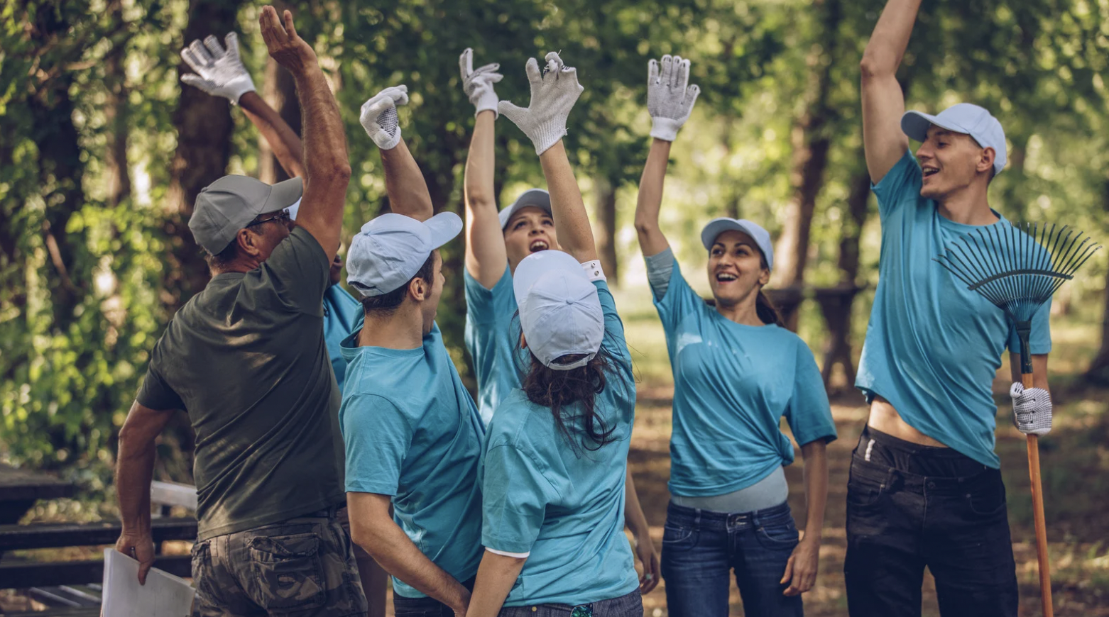 Employees volunteering in clean up initiative