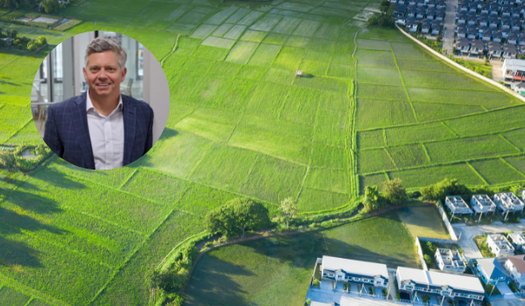 an aerial view of open land with a photo of rick wood