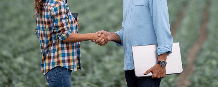 man and a woman shaking hands
