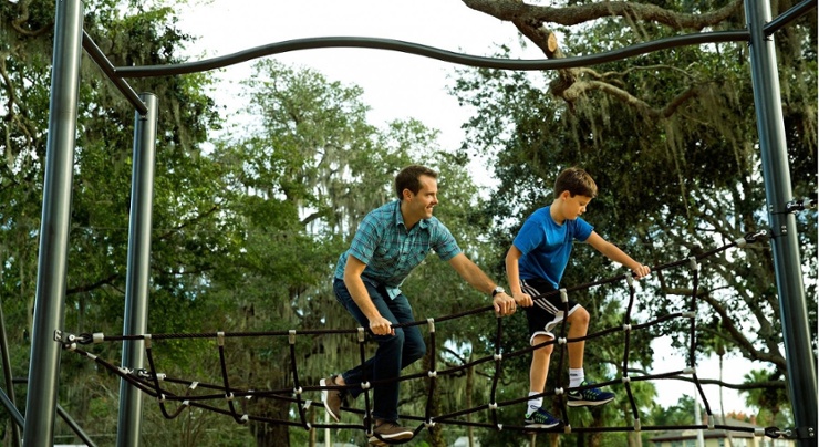 Father and son on a ropes course