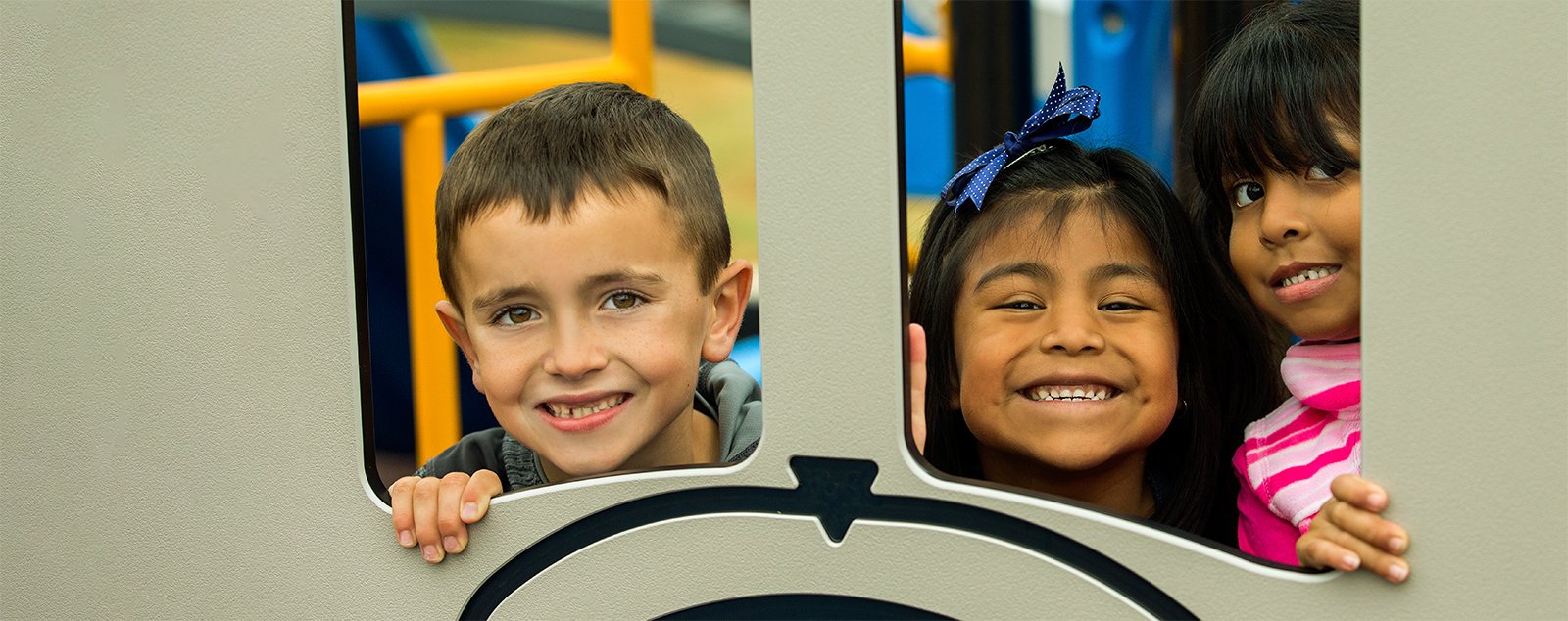 kids smiling on playground