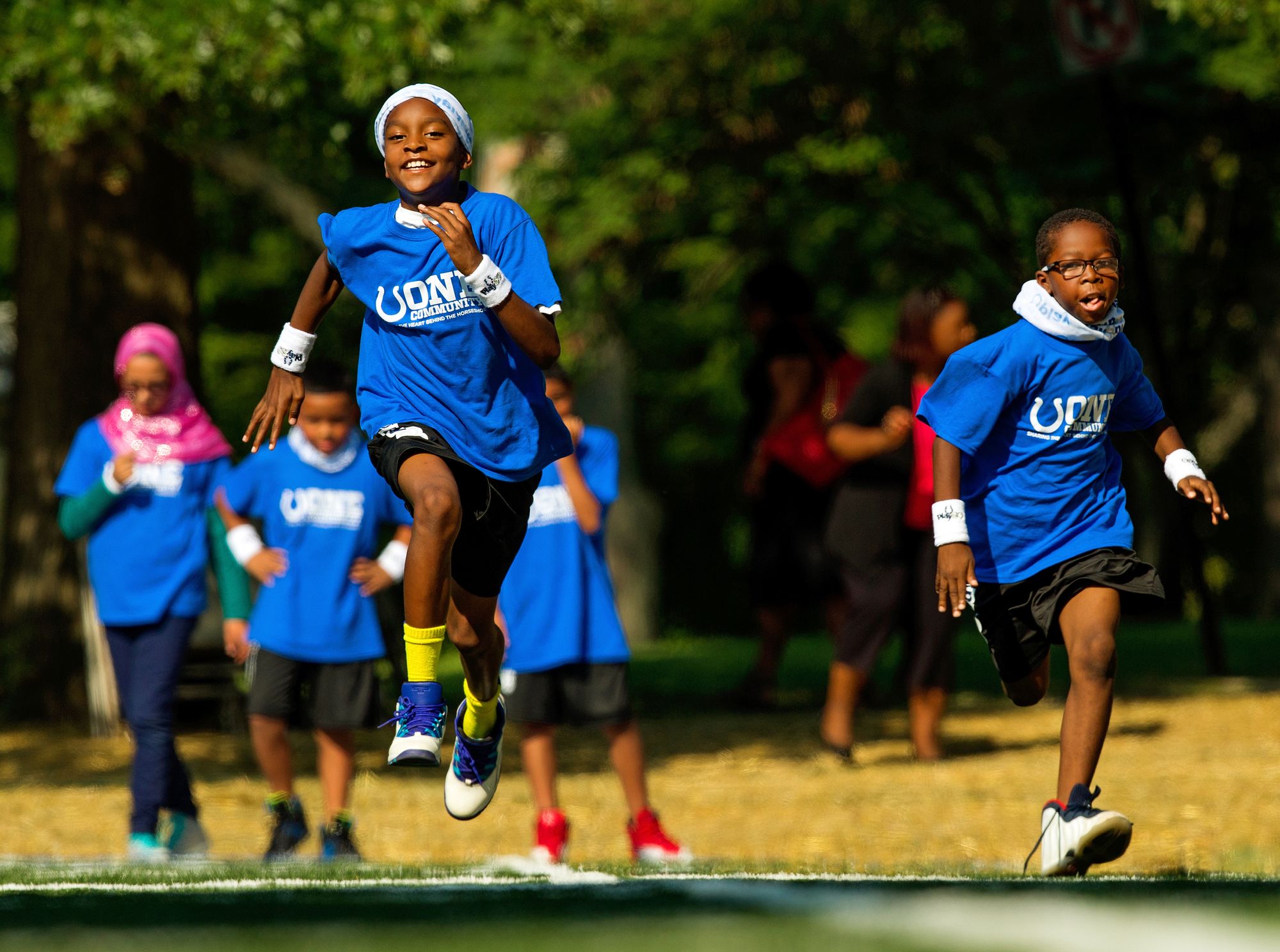 Kids running at Indianapolis Colts and Impact Parks playground