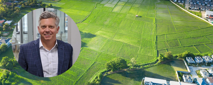 an aerial view of open land with a photo of rick wood